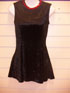 Black crushed velevt dress with red sequin trimming.