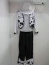 Cowboy Costume.
White and Black Shirt with vest attached, black pants, belt, red scarf and with hat.